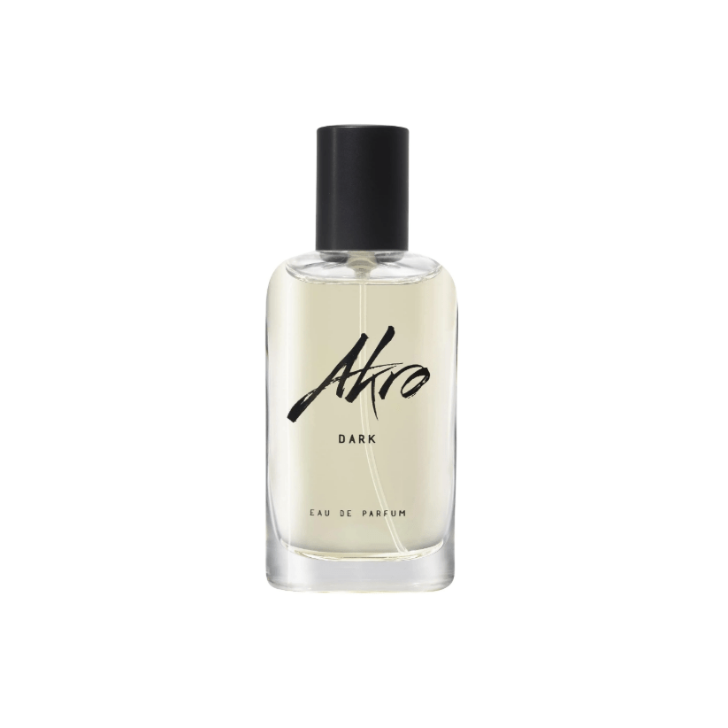 "Bottiglia di profumo Dark di Akro da 30 ml, fragranza unisex intensa con note di cacao amaro, cioccolato fondente e patchouli, su sfondo scuro e sofisticato."