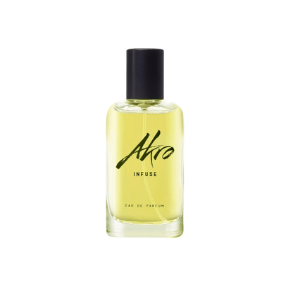 "Bottiglia di profumo Infuse di Akro da 30 ml, fragranza unisex con note di tè al gelsomino, bergamotto e muschio, su sfondo chiaro e raffinato."